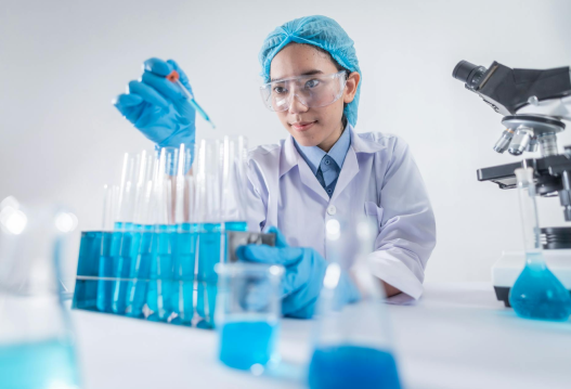 Female scientist working with test tubes in a laboratory